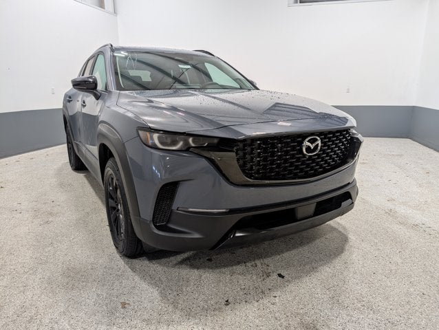 2026 Mazda Mazda CX-50 Hybrid Premium AWD in Polymetal Gray Metallic — front three-quarter view